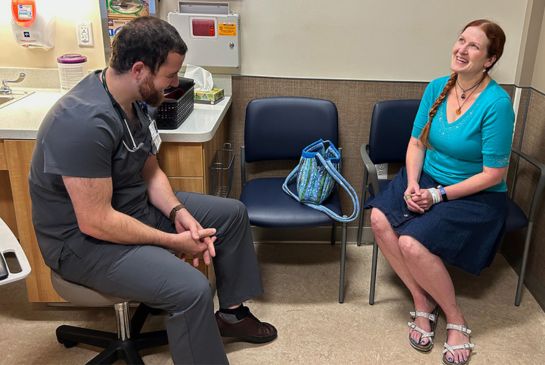 Brandon Drws meets with patient